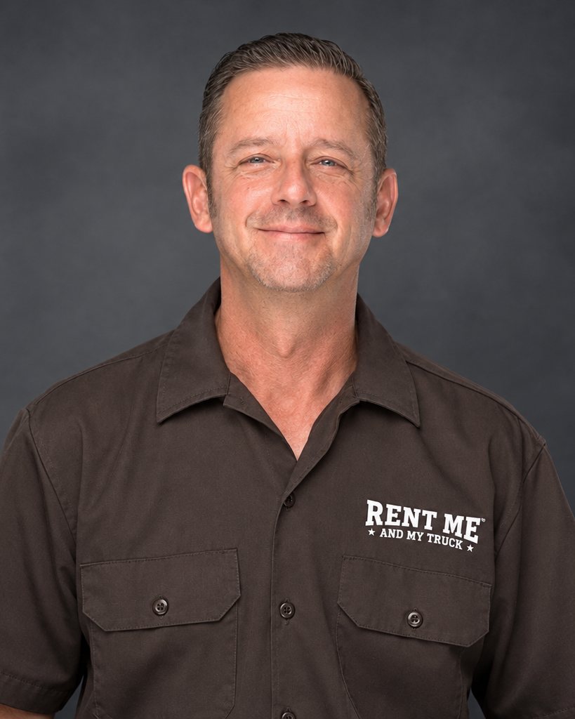 Eddie, owner of Rent Me and My Truck, in his company work shirt